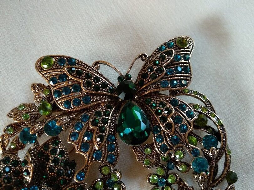 Broche vintage tipo art deco mariposa y flor cuajado piedras .Nuevo (106) - Imagen 3