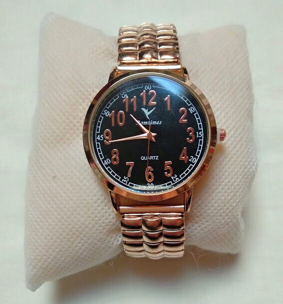 Reloj de pulsera dorado esfera negra correa extensible nuevo con etiquetas