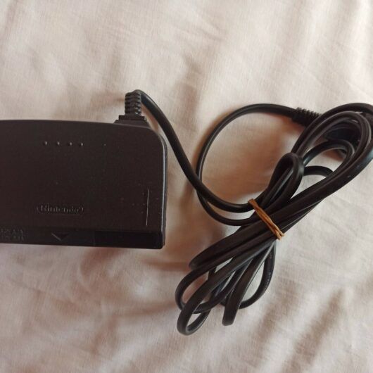 ADAPTADOR CORRIENTE NINTENDO 64 ORIGINAL NINTENDO NUEVO SIN PRECINTO (154)