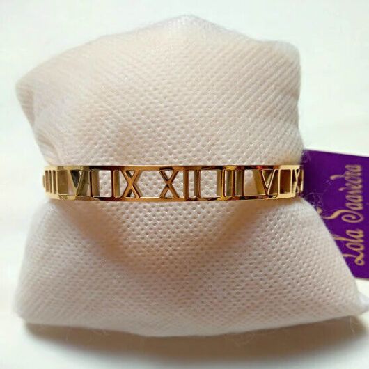 Pulsera acero mujer dorada rígida números romanos y cierre nueva