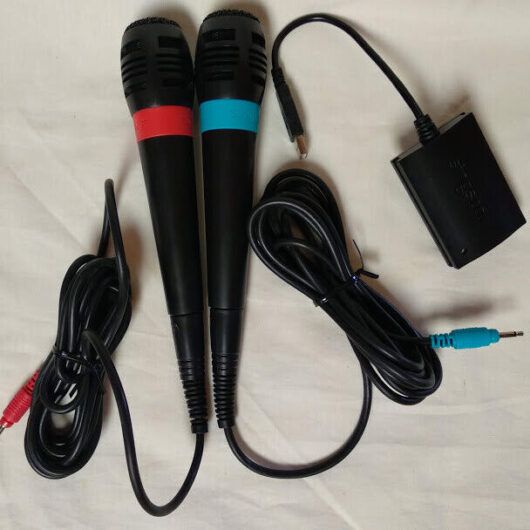 Microfonos Y Adaptador SingStar PS2 Originales Sony Pack 2 rojo y azul Nuevo