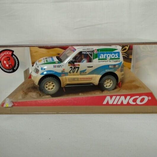 SCX Scalextric MITSUBISHI PAJERO ARGOS DESERT DIRT  ref 50323 Ninco 1/32 Nuevo